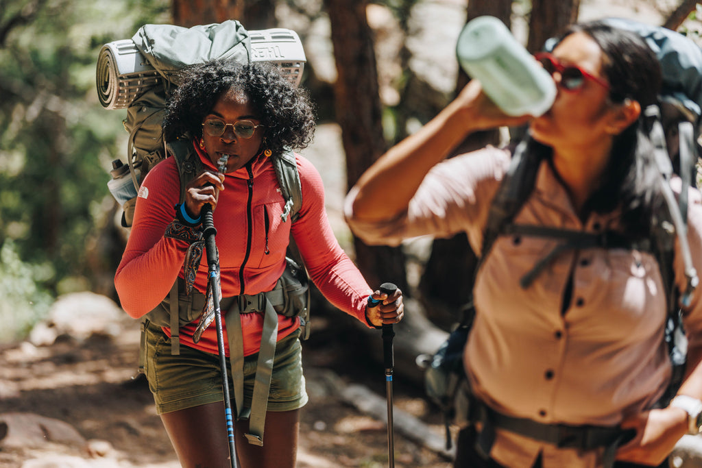 Stay Hydrated While Hiking: Water Bottles, Bladders, & Purification